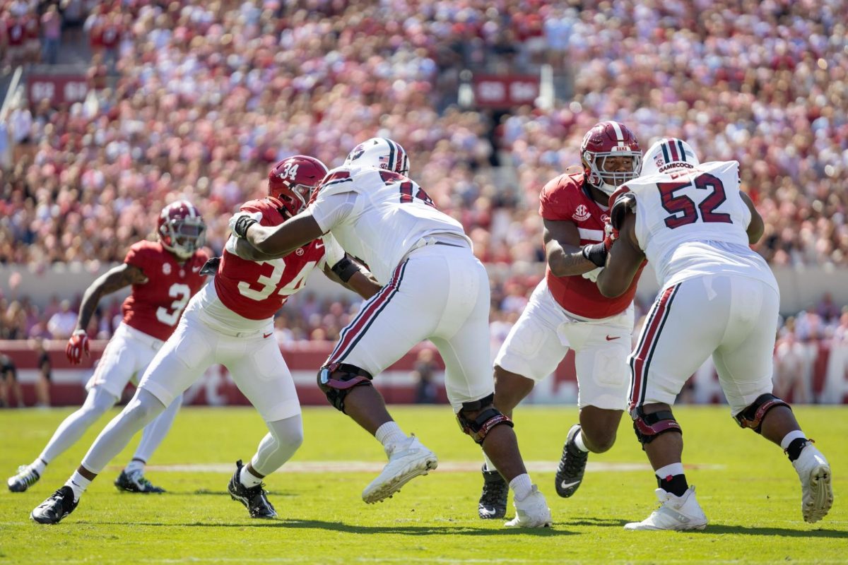 Alabama defensive linemen play against South Carolina on Oct. 12, 2024, in Tuscaloosa, AL. 