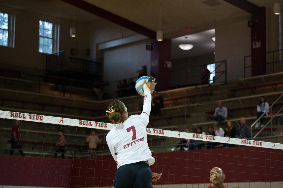 Alabama middle blocker Sarah Stevens (#7) hits a ball against Kentucky on Oct. 16, 2025. 
