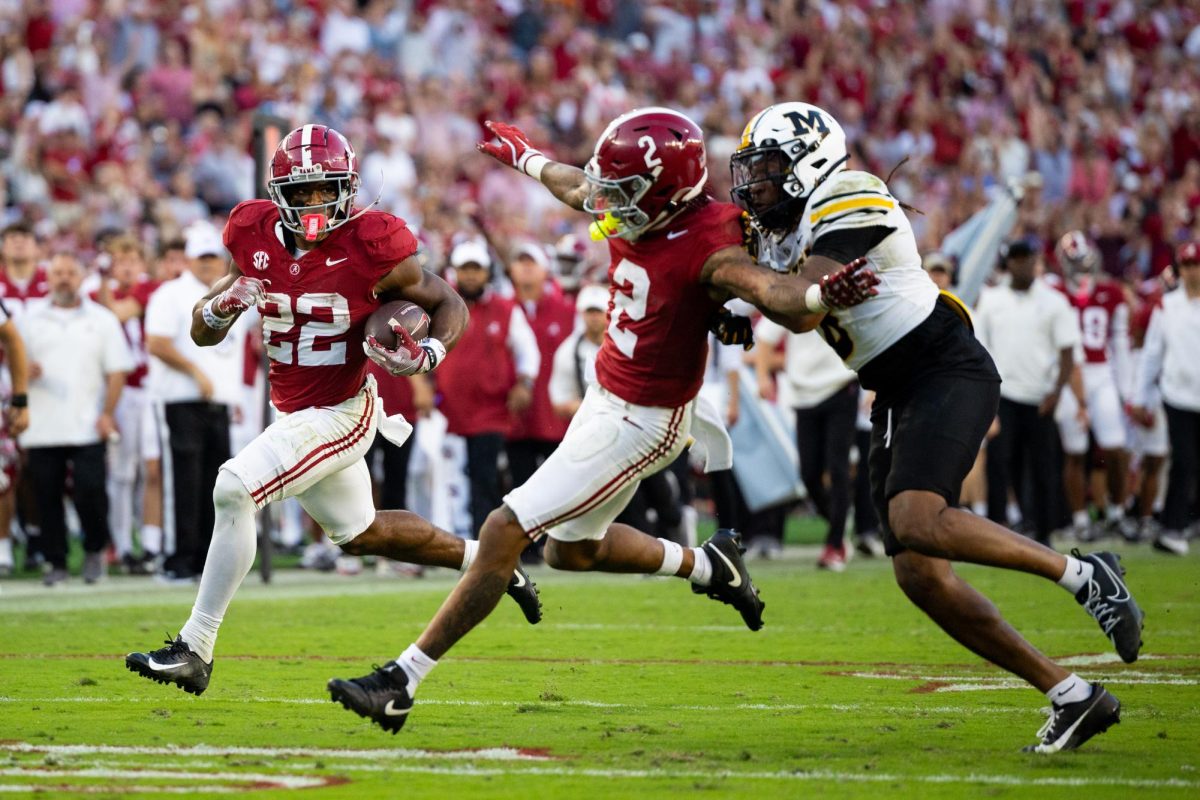 Former Alabama running back Justice Haynes (#22) runs toward the endzone against Missouri Oct. 26, 2024. 