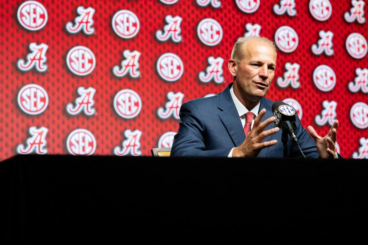 Alabama head coach Kalen Deboer speaks at SEC media days. 