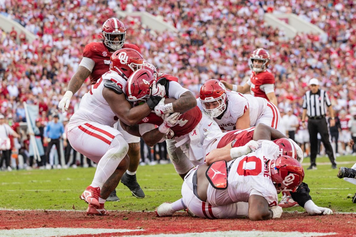 Alabama running back Daniel Hill (#4) scores a touchdown against Oklahoma. 