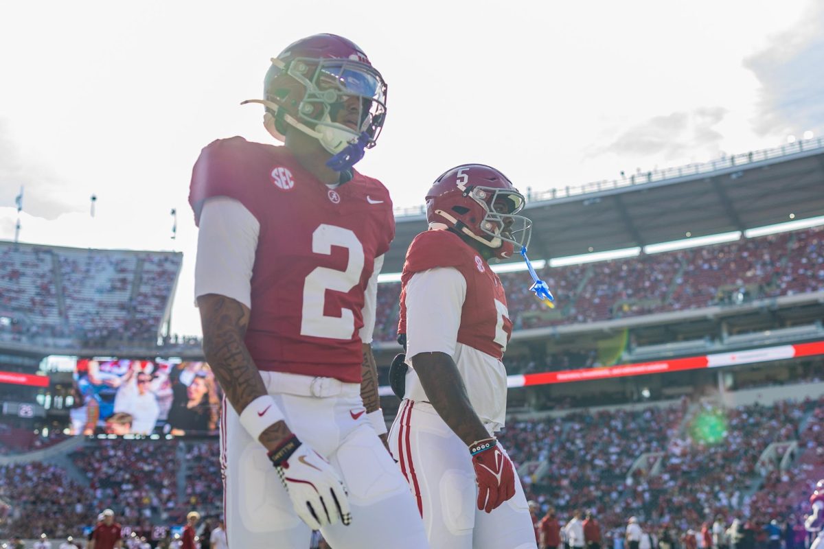 Alabama wide receiver Germie Bernard (#5) and Ryan Williams (#2) warm up before playing Oklahoma. 