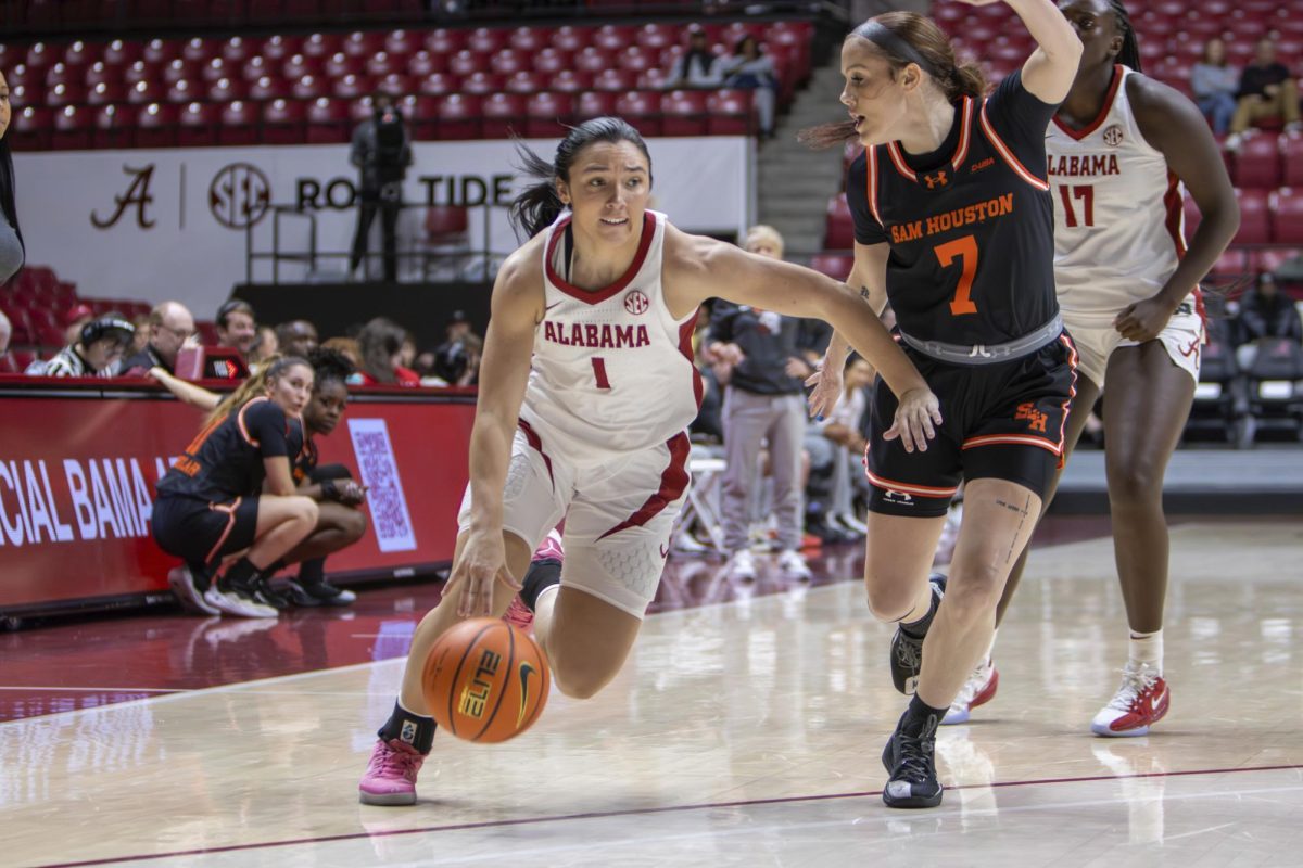 Alabama women's basketball guard Ace Austin dribbles up the court in a game against Sam Houston on Dec. 16, 2025, inside Coleman Coliseum. 