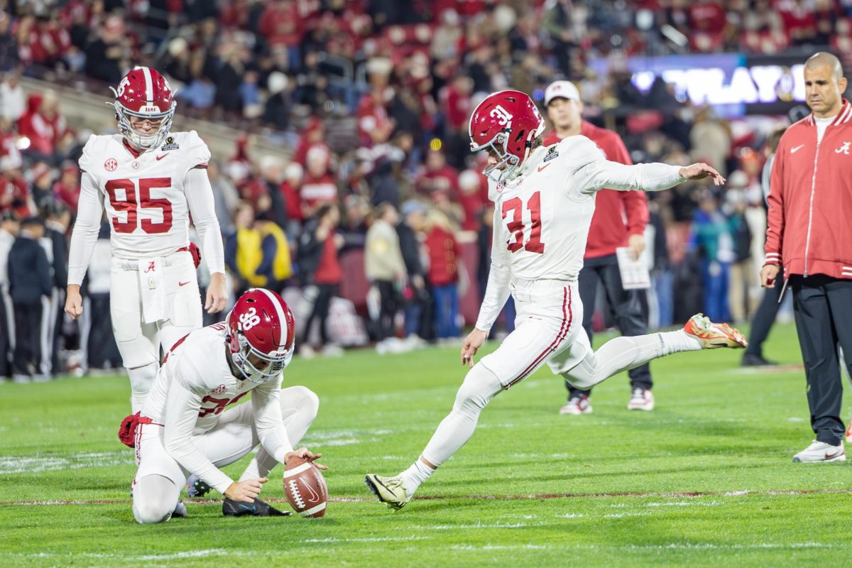 Alabama kicker Conor Talty (#31) attempts a kick during warmups before the game against Oklahoma at Gaylord Family - Oklahoma Memorial Stadium on Dec. 19, 2025. 