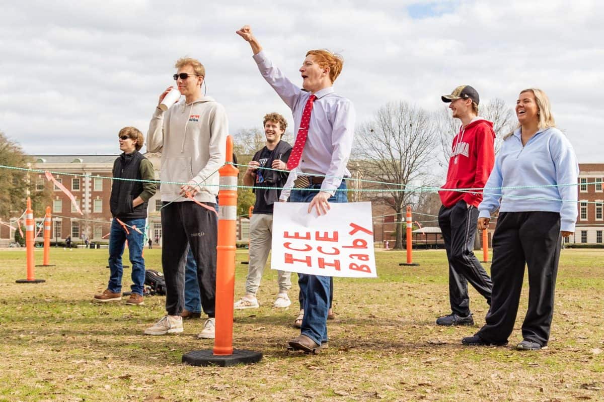 Alabama students chant at protesters.