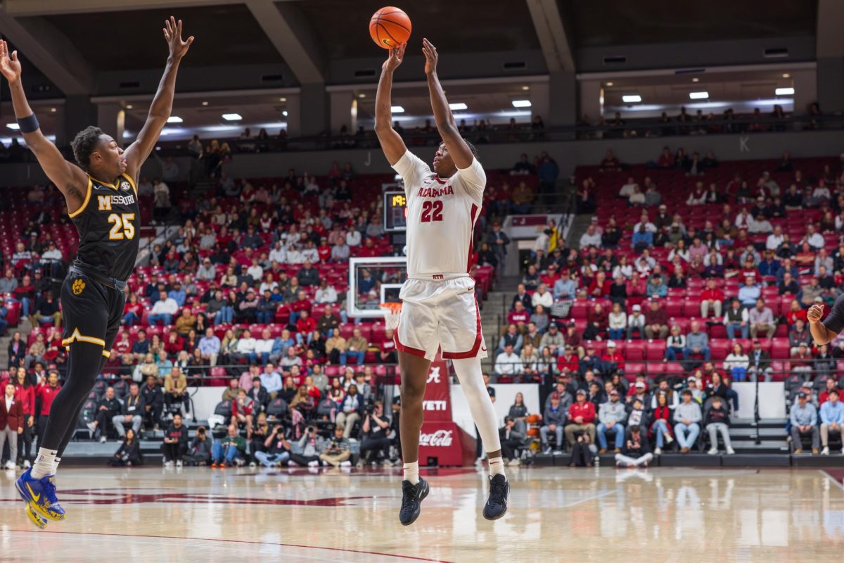 Alabama forward Aiden Sherrell (#22) shoots a three-pointer against Missouri on Jan. 27, 2026, in Coleman Coliseum.   