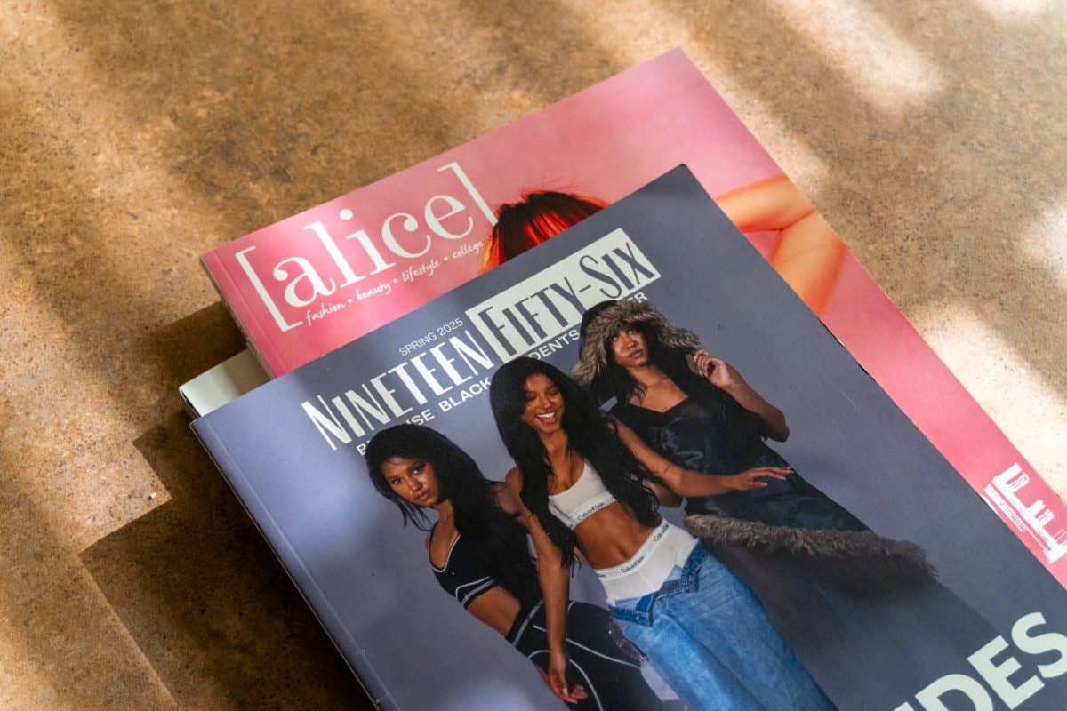 Copies of Nineteen Fifty-Six and Alice Magazine lay in a stack, photographed Dec. 3, 2025.