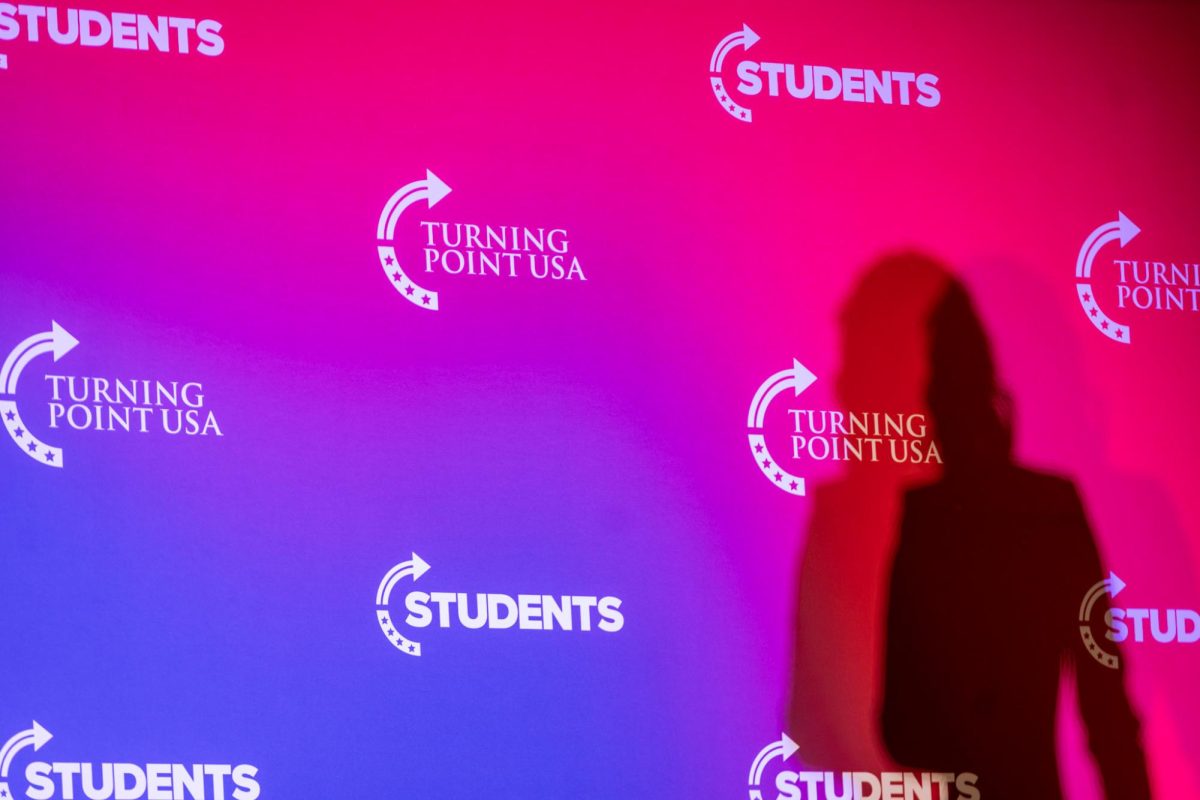 A Turning Point USA banner is lit at the organization's hosting of Savannah Chrisley on Nov. 19, 2025.