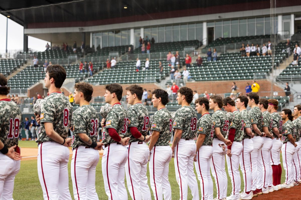 The Alabama baseball team stands during the national anthem before playing North Florida on March 8, 2026, at Sewell-Thomas Stadium. 
