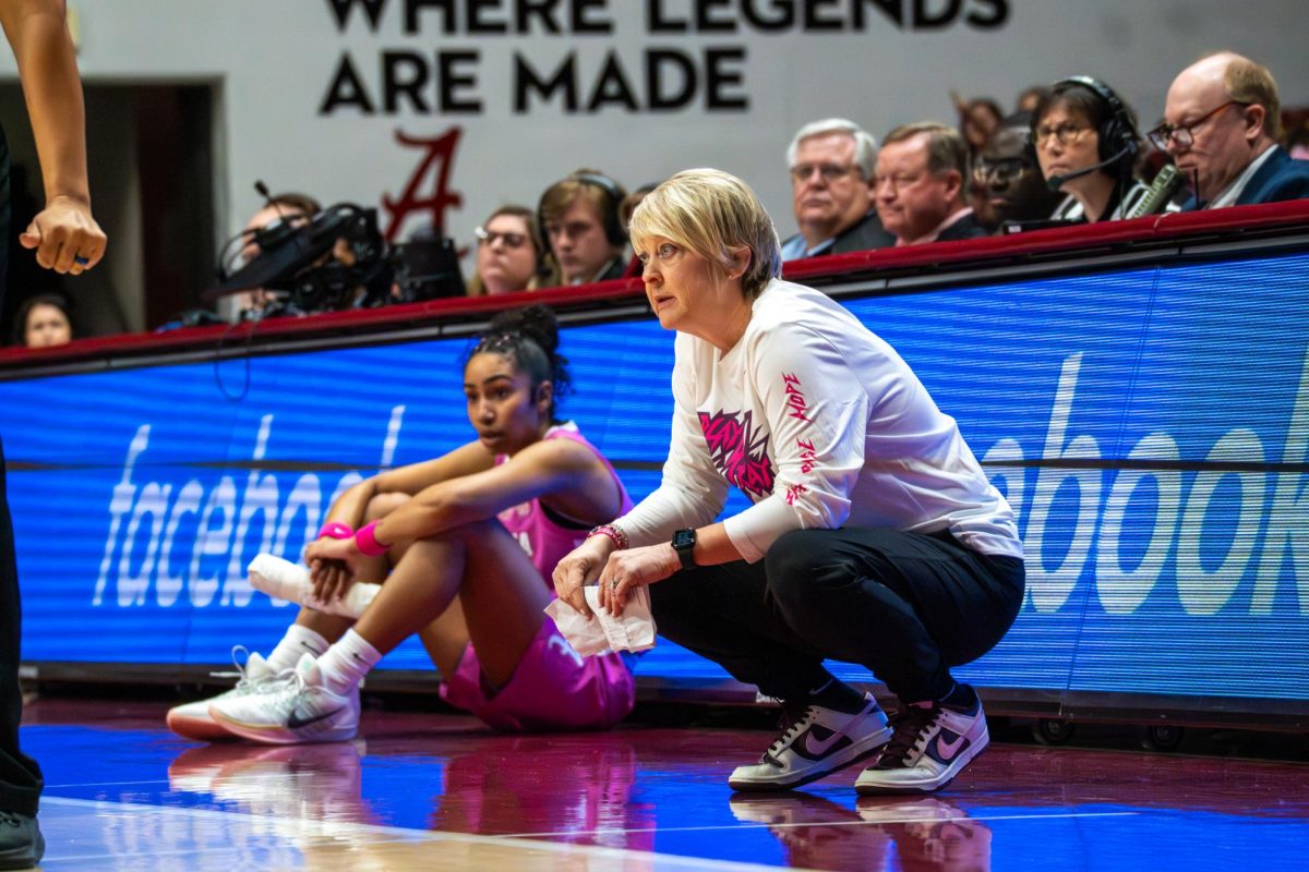 Alabama head Coach Kristy Curry watches the game against Oklahoma on Feb. 15, 2026. 