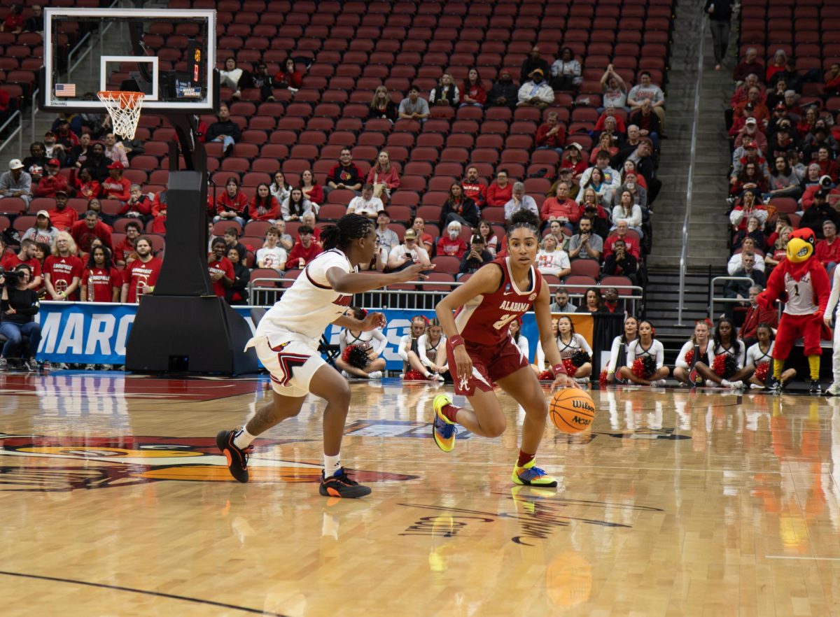Alabama guard Diana Collins (#20) dribbles down the court against Louisville in the NCAA tournament second round at the KFC Yum! Center on March 23, 2026, in Louisville, KY. 