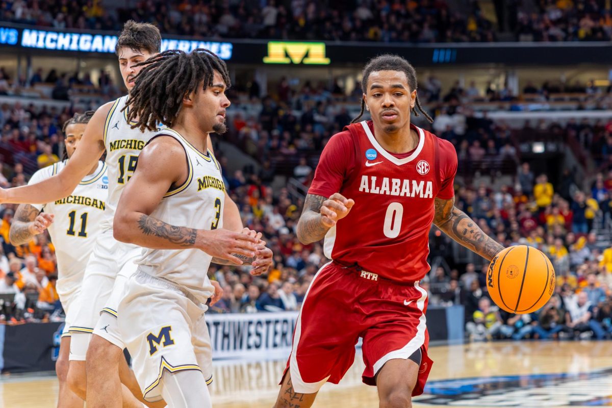 Alabama guard Labaron Philon Jr. (#0) dribbles down the court against Michigan in the NCAA Midwest Regional semifinal on March 27, 2026, at United Center in Chicago, IL. 