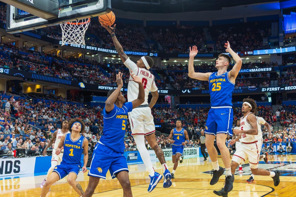 Alabama guard Labaron Philon Jr. (#0) jumps for a shot against Hofstra in the NCAA tournament first round at Benchmark International Arena on March 20, 2026, in Tampa, FL.