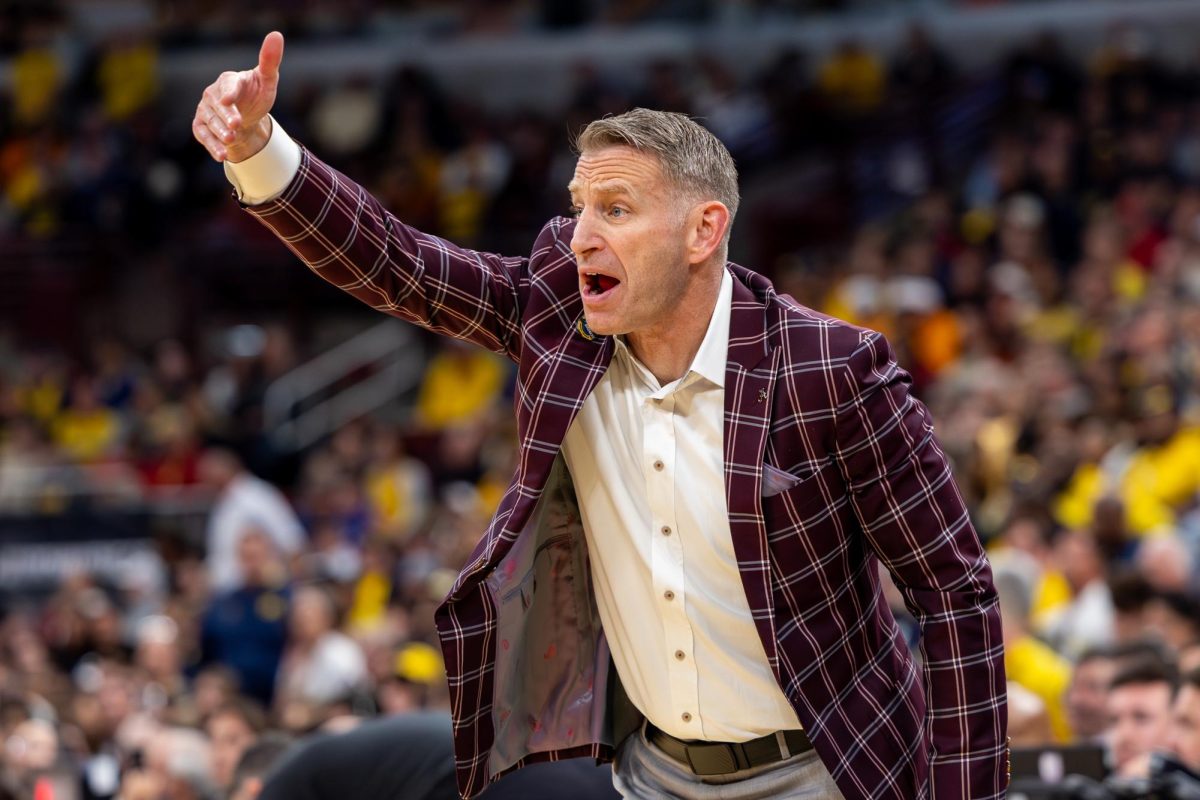 Alabama head coach Nate Oats yells at players during the NCAA tournament Sweet Sixteen versus Michigan on March 27, 2026, at the United Center in Chicago, IL. 