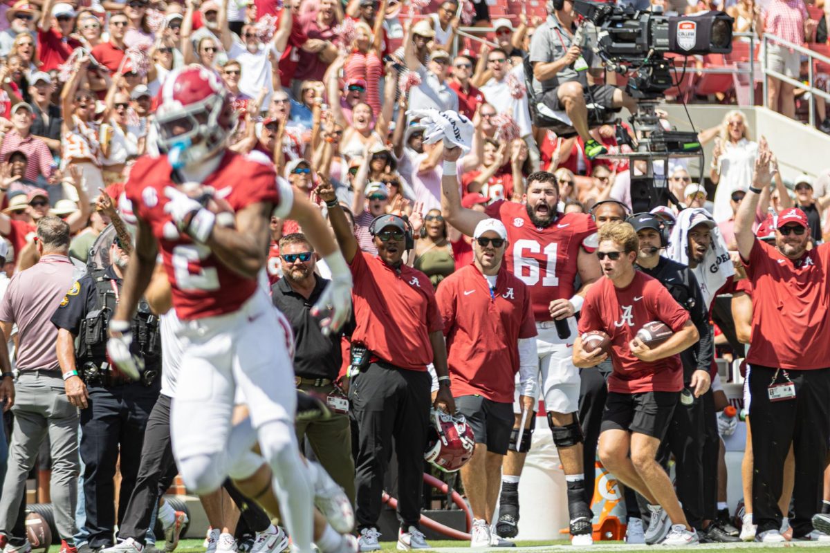 The Alabama football team celebrates as wide receiver Ryan Coleman-Williams (#2) runs with the ball against Wisconsin on Sept. 13, 2025, in Bryant-Denny Stadium.